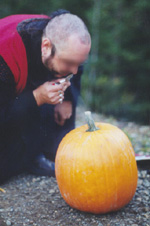 Rev. DeLuxe blesses the pumpkin